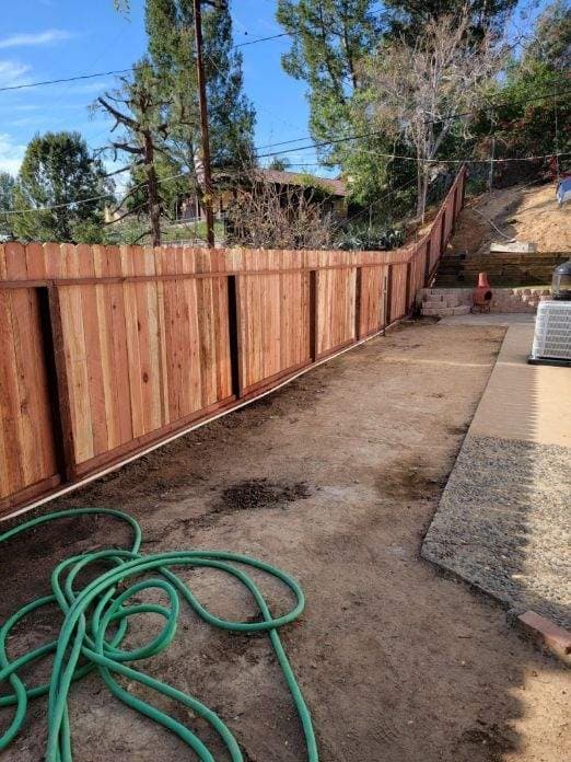 Second wood fence installation from the Empire Fence project gallery