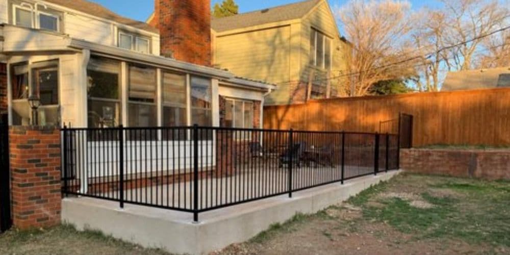 Wrought iron fence installation from the Empire Fence project gallery
